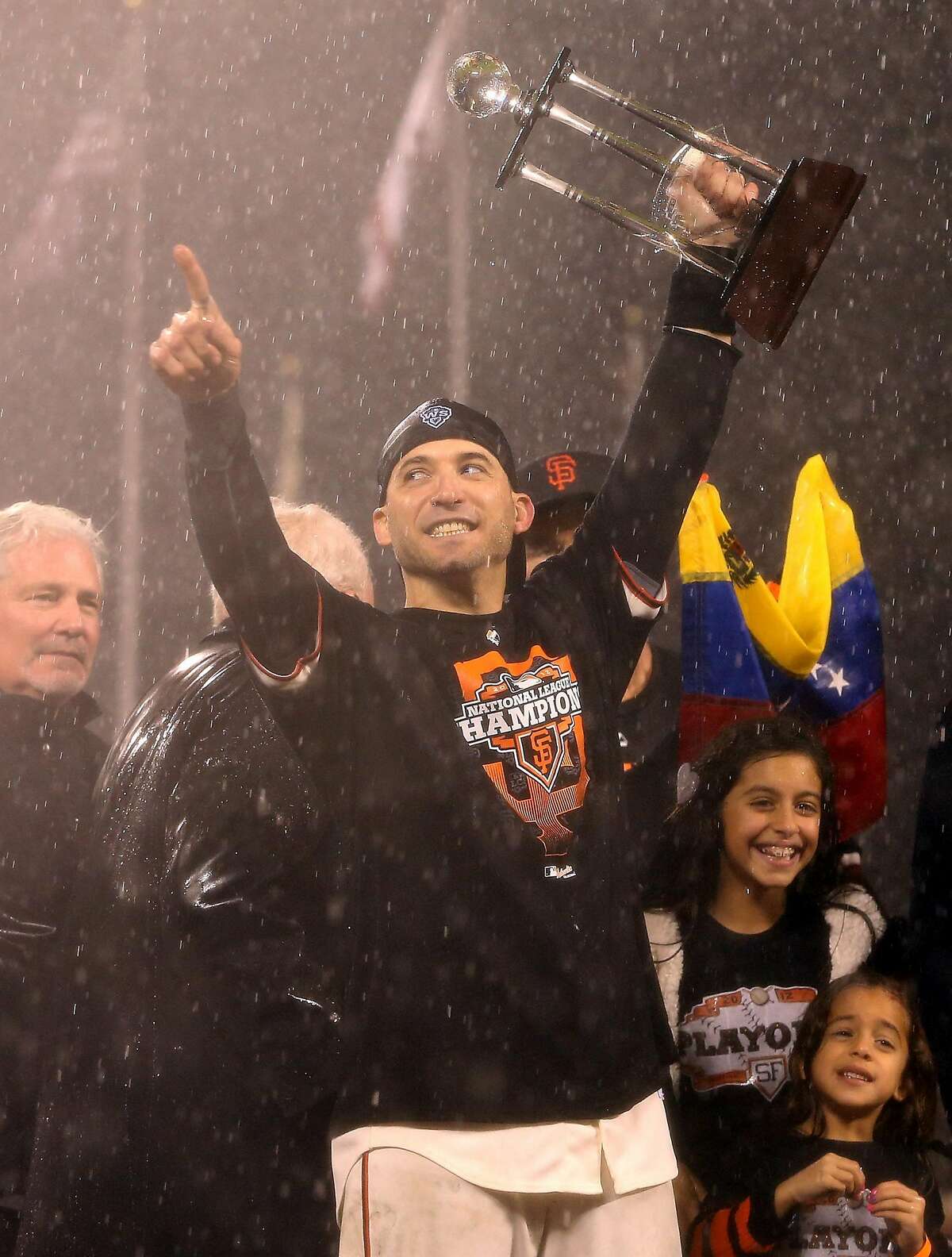 SAN FRANCISCO, CA - OCTOBER 22: Marco Scutaro #19 of the San Francisco Giants holds up the MVP trophy after the Giants defeat the St. Louis Cardinals 9-0 in Game Seven of the National League Championship Series at AT&T Park on October 22, 2012 in San Francisco, California. (Photo by Christian Petersen/Getty Images)