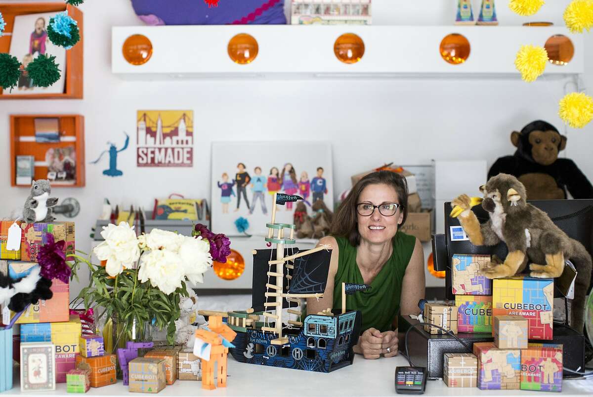 Jenna Hartman works at her store Glammic, a kids boutique, on Vallejo Street at the corner of Polk Street in San Francisco, Calif., on Saturday, May 28, 2016. The SF Planning Commission will be holding a hearing on Thursday, June 2, 2016 to discus a proposal to turn the vacant building that formally housed Lombardi's Sports, located at Polk and Jackson, into the city's first 365 by Whole Foods Market. Hartman was hoping a similar retail store, such as Sports Basement, would ultimately take over the space, but thinks a the 365 store could possibly bring foot traffic.