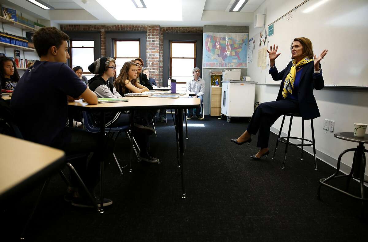 House Minority Leader Nancy Pelosi, D-San Francisco, talks to 8th grade students during her trip to Children's Day School in San Francisco, California, on Tuesday, May 31, 2016.