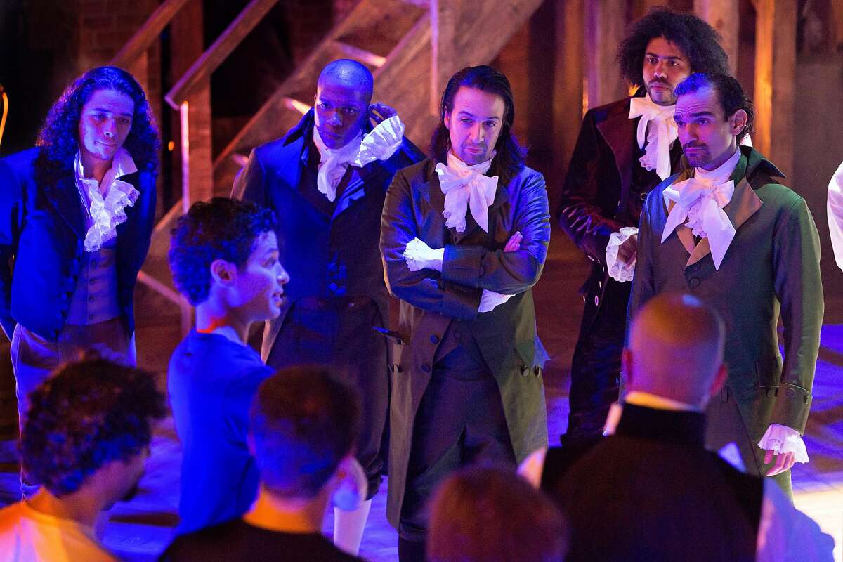 From left: Anthony Ramos, Leslie Odom Jr., Lin-Manuel Miranda, Daveed Diggs and Javier Munoz on stage listening to director Thomas Kail at the start of a rehearsal of the musical "Hamilton" at the Richard Rodgers Theater in New York, July 8, 2015. �Hamilton,� is a Broadway musical, hip-hop retelling of the life of the nation�s first Treasury secretary, Alexander Hamilton. (Sara Krulwich/The New York Times)