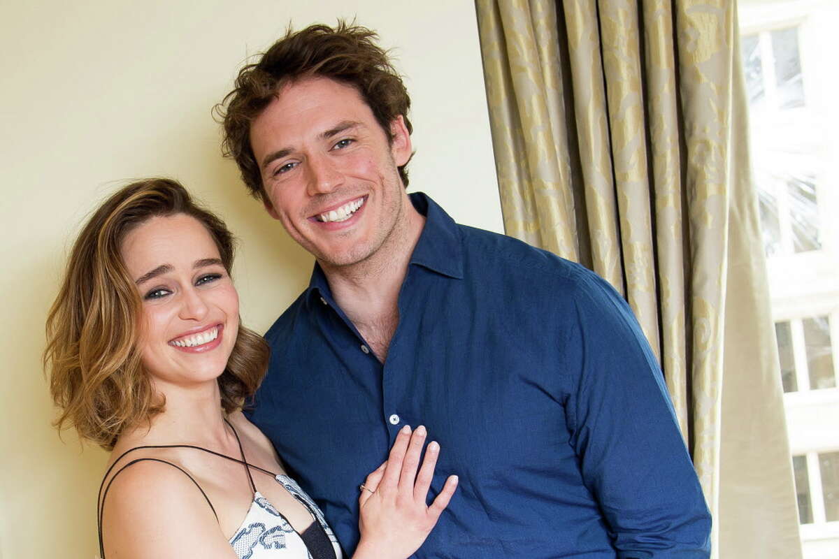 In this May 21, 2016 photo, actors Emilia Clarke, left, and Sam Claflin pose for a portrait to promote their film, "Me Before You" in New York. (Photo by Charles Sykes/Invision/AP) ORG XMIT: NYET243