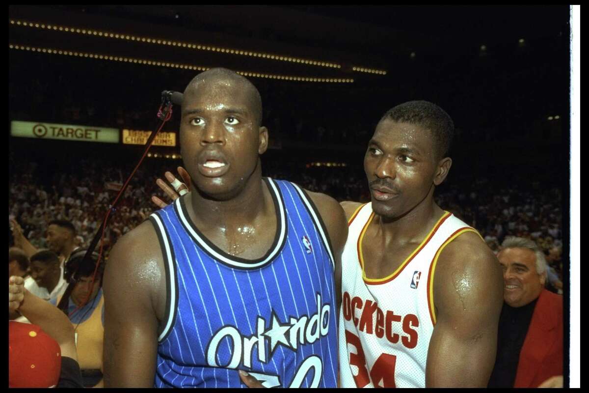 14 Jun 1995: Center Shaquille O''Neal of the Orlando Magic (left) and Houston Rockets forward Hakeem Olajuwon look on after Game Four of the NBA Finals at the Summit in Houston, Texas. The Rockets won the game, 113-101. Mandatory Credit: Allsport /Allsp