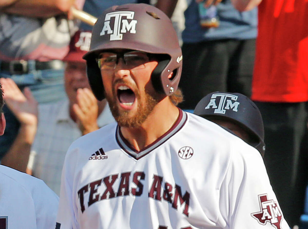 Texas A&M’s Jonathan Moroney shouts in celebration after scoring against Florida in the eighth inning of the Southeastern Conference baseball championship game on May 29, 2016, in Hoover, Ala.