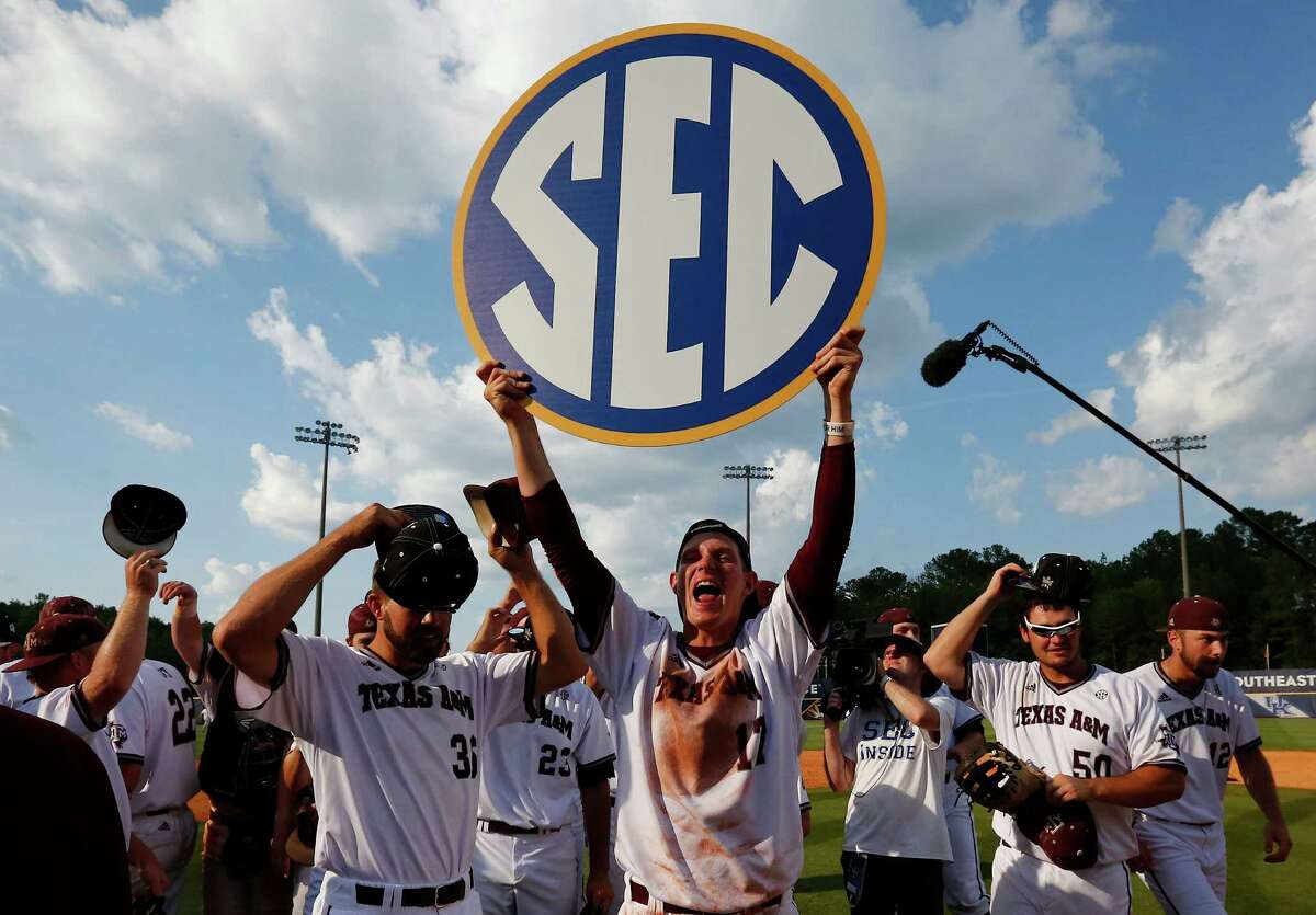 Texas A&M’s players celebrate their win over Florida after the Southeastern Conference baseball championship game at the Hoover Met on May 29, 2016, in Hoover, Ala.