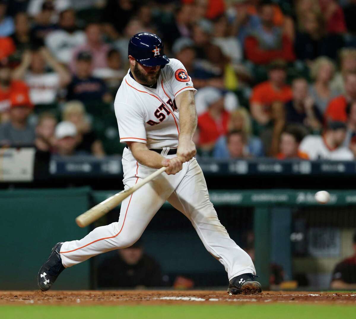 Houston Astros Evan Gattis (11) hits his two-run home run in the fifth inning of an MLB baseball game at Minute Maid Park, Wednesday, June 1, 2016, in Houston. ( Karen Warren / Houston Chronicle )
