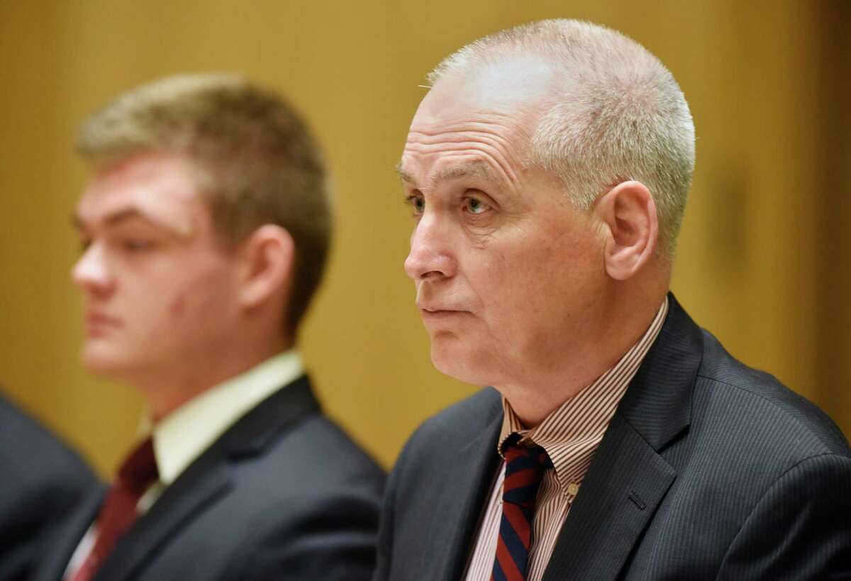 Attorney Eugene Riccio, right, speaks on behalf on Andrew Schmidt, 17, of Greenwich, as Schmidt is arraigned at the Connecticut Superior Court in Stamford, Conn. Thursday, June 2, 2016. Schmidt is charged with evading responsibility in an accident that results in a fatality, a felony punishable by up to 10 years in prison, in connection with the hit-and-run collision that killed Edward Setterberg on April 17.