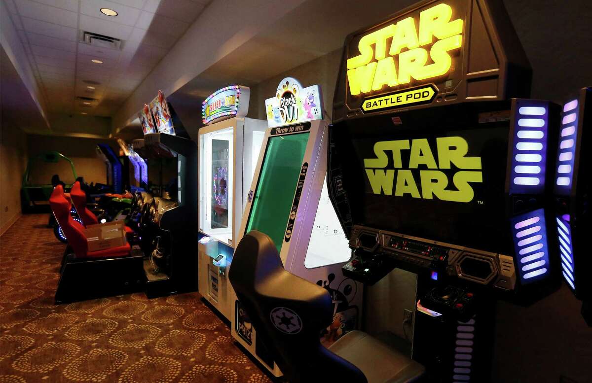 Inside the Santikos Casa Blanca Theater and bowling alley complex