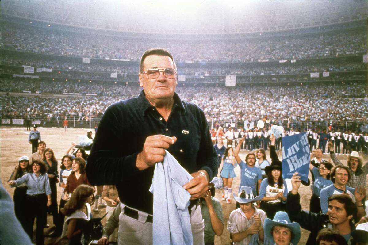 Houston Oilers coach Bum Phillips shows the emotion that he shared with many of his players as they were welcomed by a crowd of more than 55,000 inside the Astrodome on Jan. 6, 1980 after returning from Pittsburgh. For the second year in a row, the Oilers lost the AFC championship game to the Steelers but still received an enthusiastic welcome from their fans.