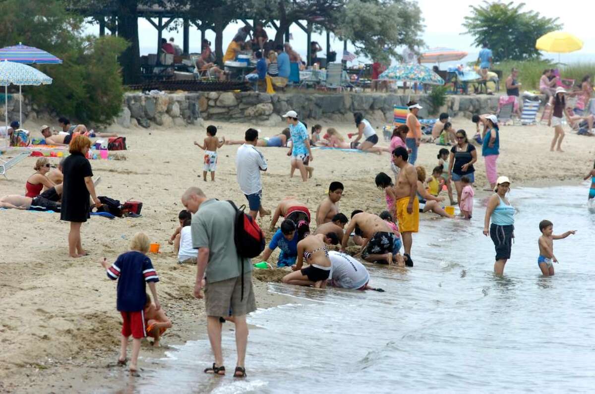Crowds flock to Island Beach to kick off the holiday weekend grilling and swimming.