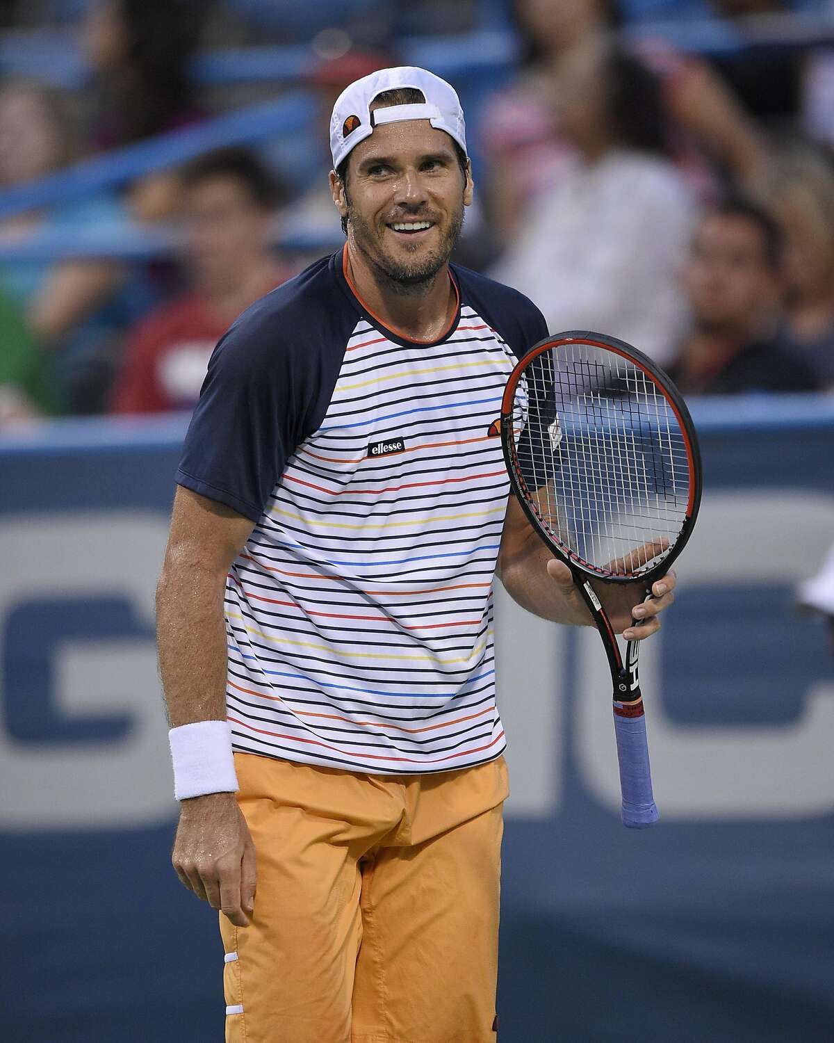 FILE - In this Aug. 3, 2015, file photo, Tommy Haas, of Germany, reacts during a match against Donald Young at the Citi Open tennis tournament in Washington. Tommy Haas was hired Friday, June 3, 2016, as tournament director of the BNP Paribas Open, replacing Raymond Moore, who quit in March after making controversial comments about female players. Haas' hiring must be approved by the ATP and WTA tours, which play at the combined $7 million, two-week event every March in the Southern California desert. (AP Photo/Nick Wass, File)