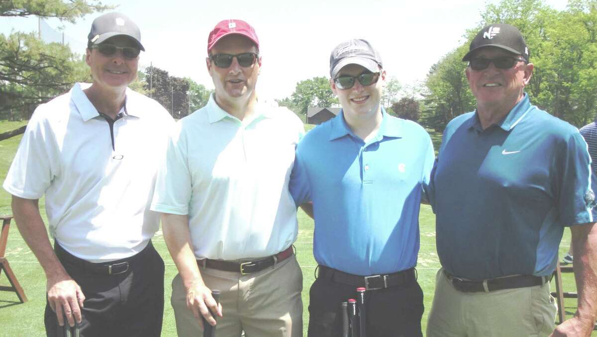 New York Mets third base coach and Greenwich native Tim Teufel, Chris Westfahl, Kevin Westfahl and Mets pitching coach Dan Warthen at Innis Arden Golf Club in Old Greenwich last week.