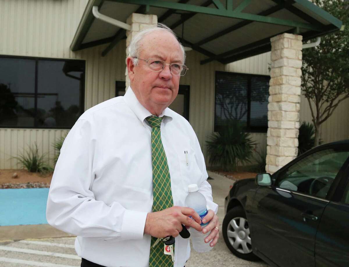 FILE - In this May, 25, 2016, file photo, Baylor University President Ken Starr leaves a terminal at the airport in Waco, Texas. Starr resigned as Baylor's chancellor Wednesday, June 1, 2016, a week after he was removed as president of the Texas school amid a scandal over its treatment of sexual assault cases involving football players. (Rod Aydelotte/Waco Tribune Herald, via AP, File) MANDATORY CREDIT