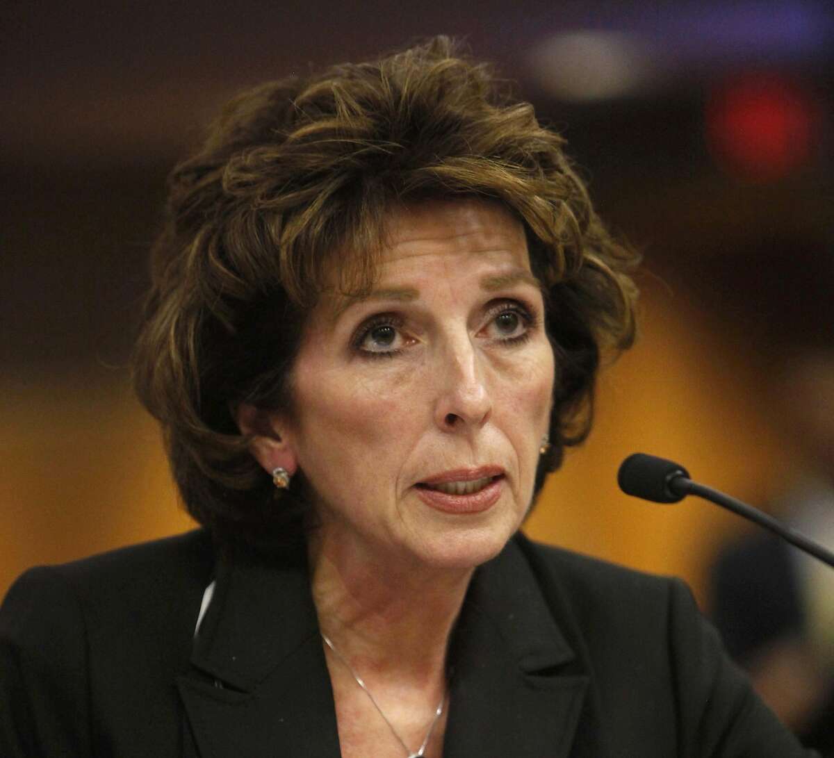 FILE - In this Dec. 14, 2011 file photo, University of California, Davis, Chancellor Linda Katehi, told lawmakers that she never ordered campus police to use force or pepper spray on students last month, while testifying at a legislative hearing at the Capitol in Sacramento, Calif. Katehi has been placed on leave amid an uproar stemming in part from the school's hiring of consultants to improve its image, following a widely criticized protest pepper spraying incident by police. UC President Janet Napolitano's office announced Wednesday, April 27, 2016, that she is appointing an outside investigator to determine whether the actions of Chancellor Katehi have violated university policies. (AP Photo/Rich Pedroncelli, File)
