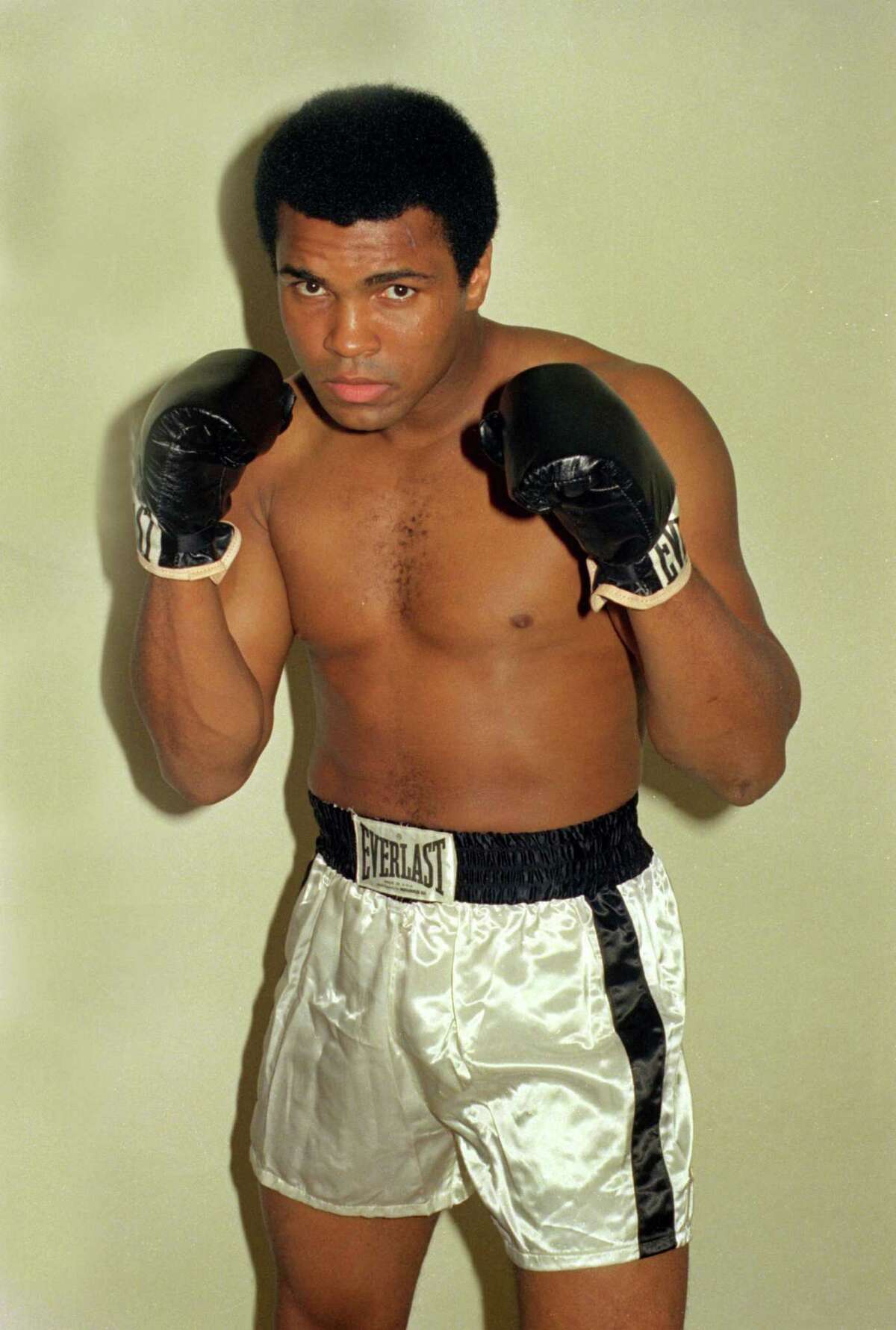 FILE - This is an Oct. 9, 1974, file photo showing Muhammad Ali. Ali, the magnificent heavyweight champion whose fast fists and irrepressible personality transcended sports and captivated the world, has died according to a statement released by his family Friday, June 3, 2016. He was 74.