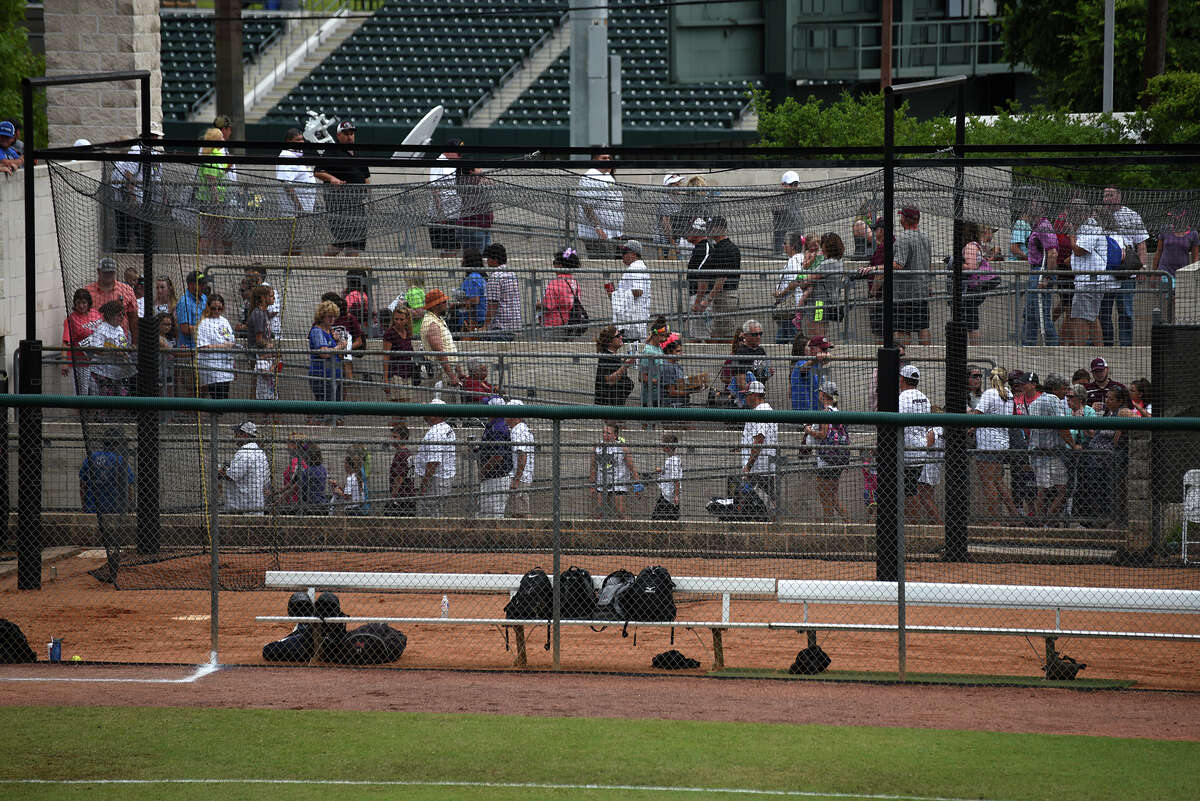 Fans were forced to exit the stands at McCombs Field after a lightning strike caused an interruption of play in the top of the first inning of the Class 6A finals matchup between the Pearland Lady Oilers and the Keller Lady Indians at the 2016 UIL Softball State Championships at McCombs Field in Austin on Saturday, June 4, 2016. (Photo by Jerry Baker/Freelance)