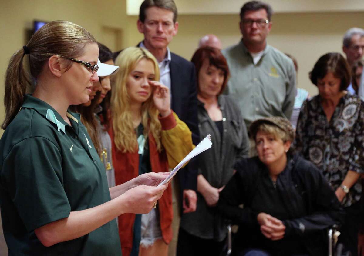 Karen Petree, left, a 2007 Baylor University graduate reads an open letter to the administration about the about improvements the school should make on handling sexual assaults, Friday, June 3, 2016, in Waco, Texas. 