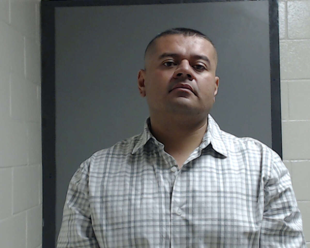 Juan Cerrillo was arrested Saturday and charged with cruelty to a non-livestock animal after he left his police-assigned canine partner in a car and it died.