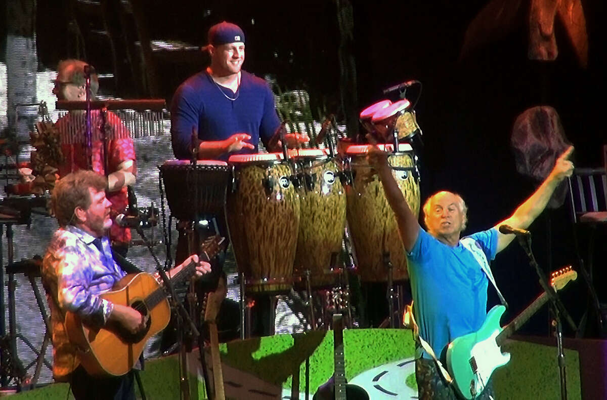 J.J. Watt plays conga drums for Jimmy Buffett at The Woodlands Pavilion.
