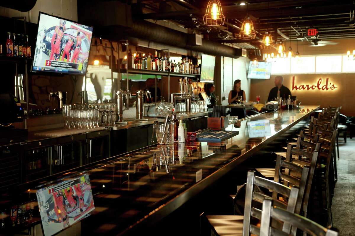 Customers can grab a drink at Harold's Tap Room before dining upstairs.