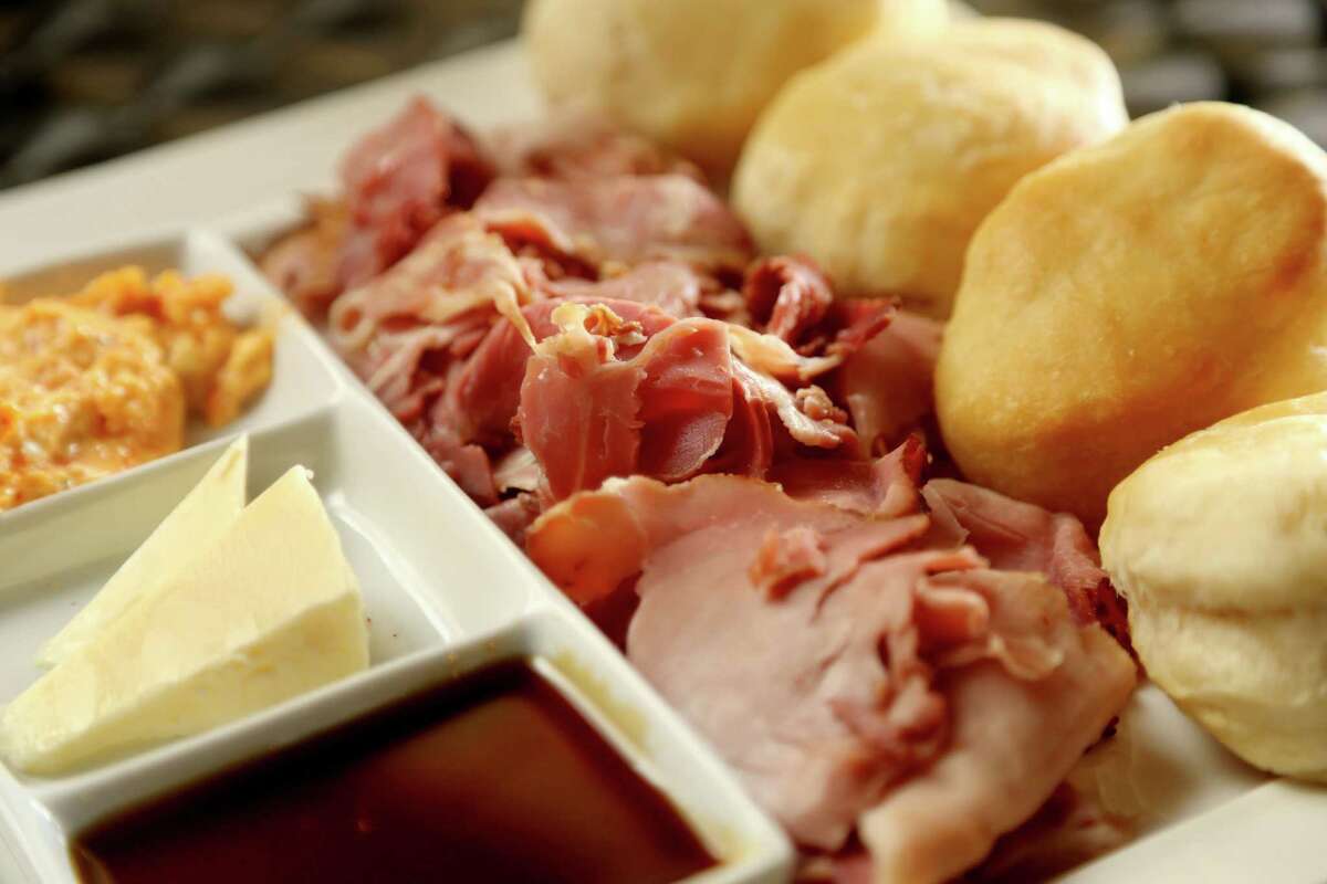 Country ham plate: house-made country ham with cultured butter, Steen's cane syrup and biscuits, at Harold's Tap Room