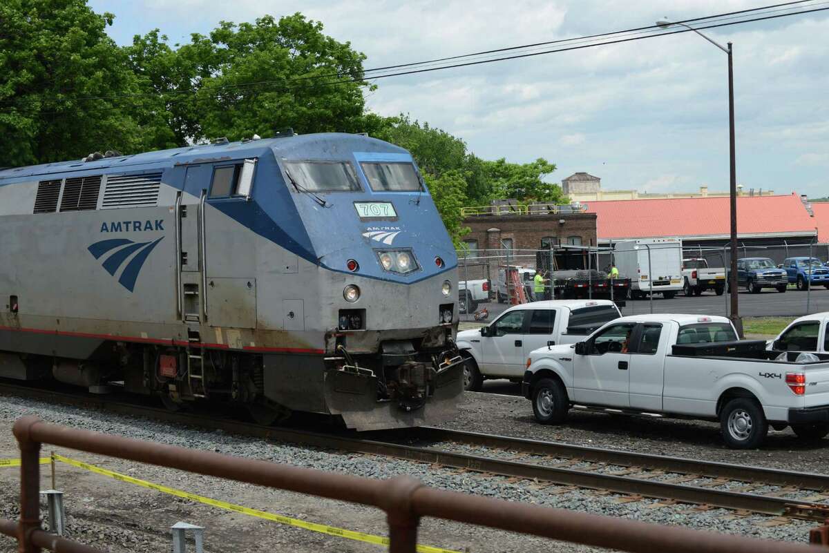 An Amtrak passenger train from Schenectady heads down the line near Broadway and North Pearl Street where work has begun on adding a second track on Monday, June 6, 2016, in Albany. Passengers along Amtrak's Empire Corridor will eventually see new trains to replace some of the railroad's oldest equipment. But it likely will take three years or more for arrival of the first trains. (Will Waldron/Times Union)