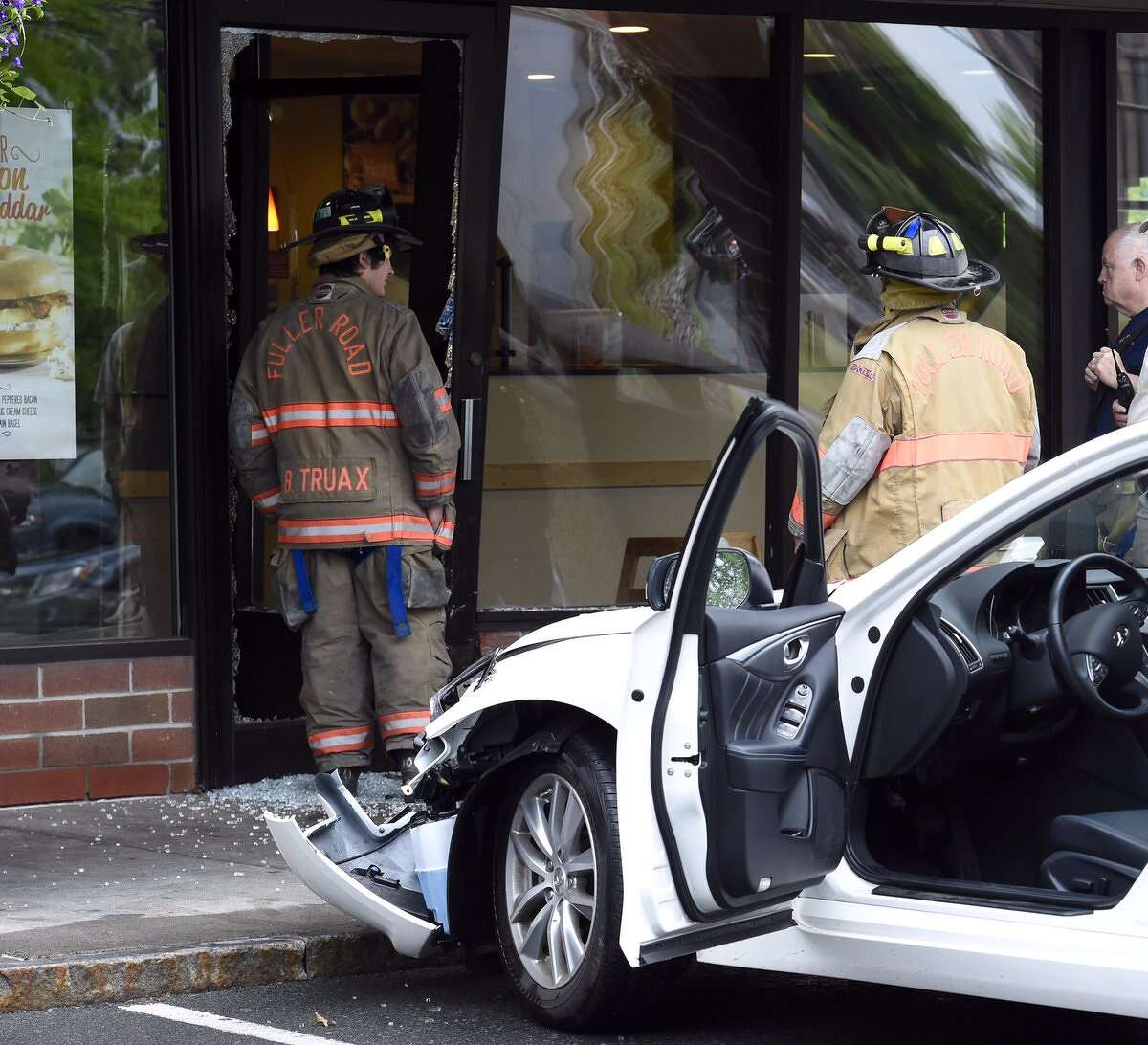 A car crashed into the Bruegger’s Bagel Bakery on Wolf Road Tuesday morning, June 7, 2016. The car struck the front of the building but it was unclear if anyone was injured in the incident, which happened at about 7:30 a.m.(Skip Dickstein / Times Union)