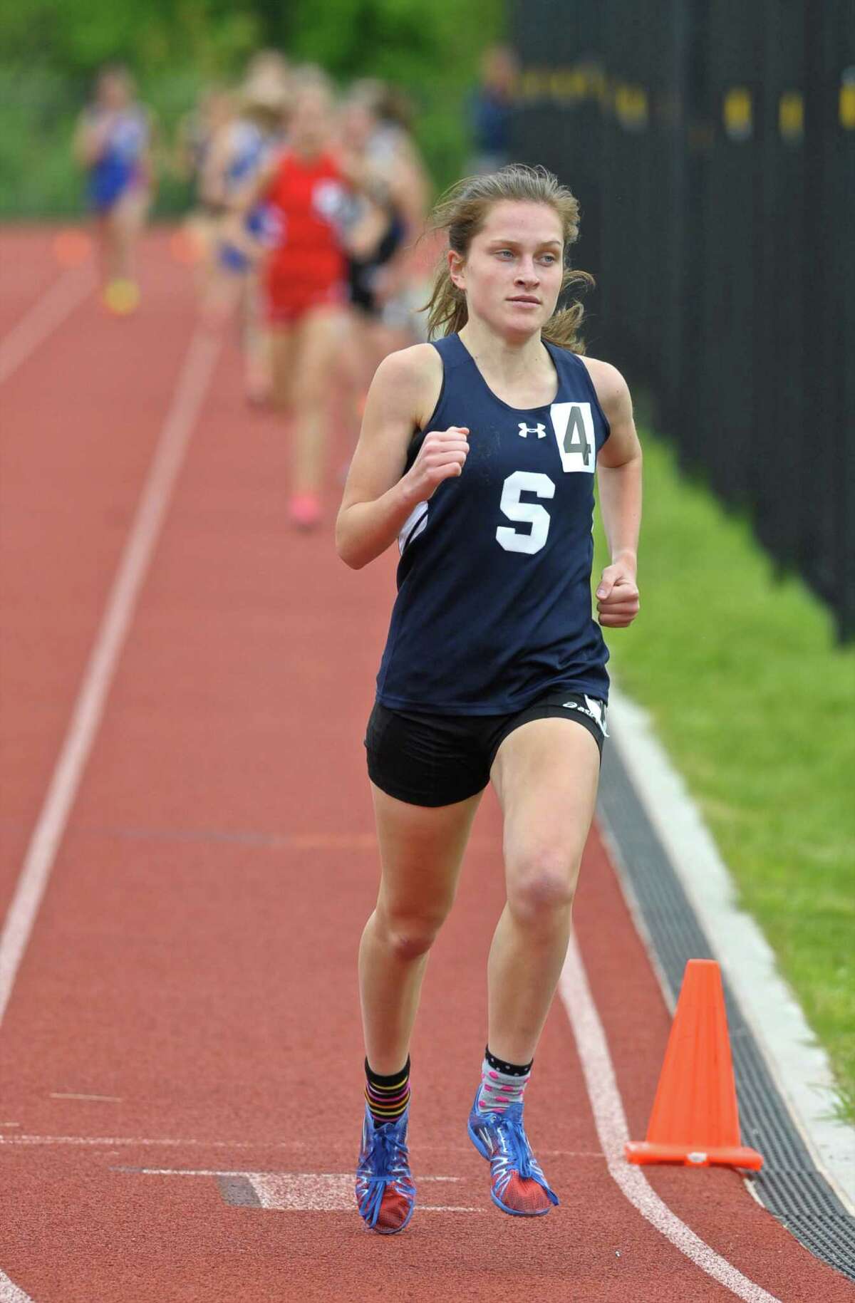 Staple's Hannah DeBalsi competes in the 1600 meter run at the FCIAC girls track championships, held at Bethel High School, Saturday, May 21, 2016, in Bethel, Conn.