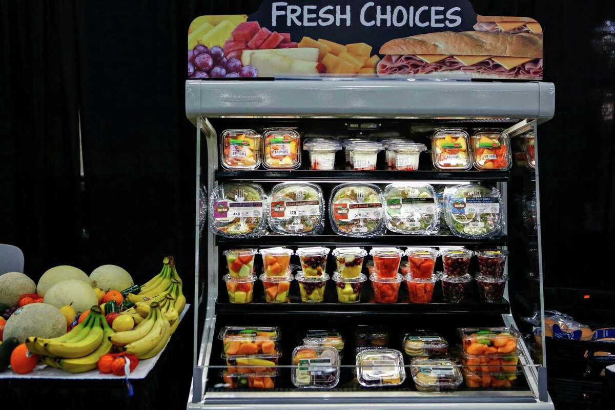 Fresh salads and fruit on display at the CST Brands Inc. trade show hosted for over 1000 CST store managers in Exhibit Hall A at the Henry B. Gonzales Convention Center downtown on Jan 20, 2015. The foreign owners of the 7-Eleven chain of mini-marts and Canada’s Alimentation Couche-Tard Inc., the parent company for Circle K, along with a consortium of private equity firms including Blackstone Group and Apollo Capital Management have reportedly offered to buy CST.