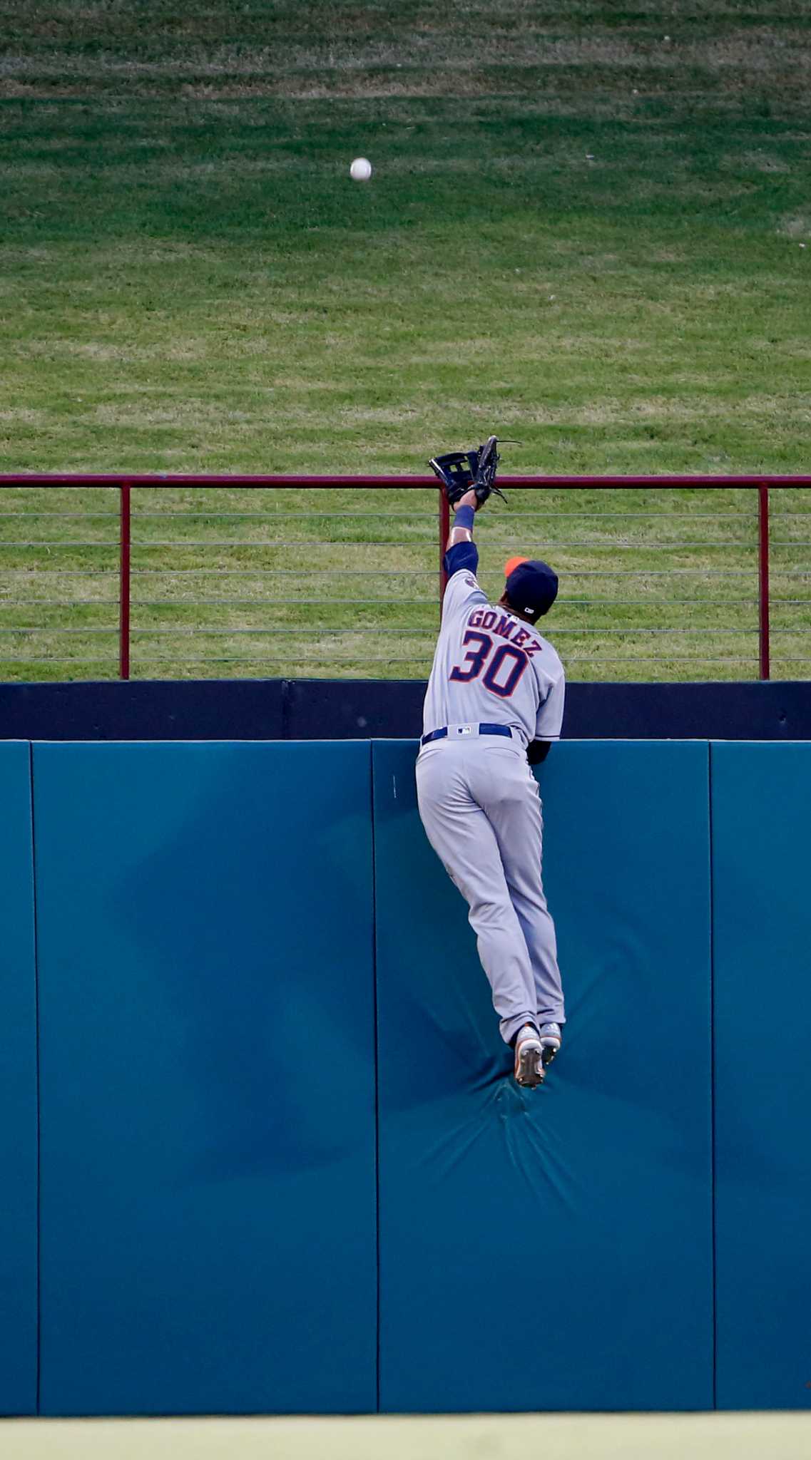 Pitcher Cole Hamels #35 of the Texas Rangers watches the New York