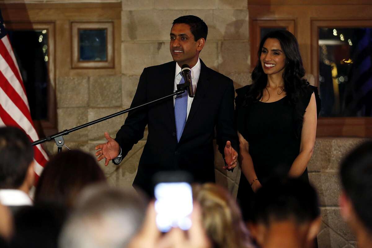 Ro Khanna (left) speaks to supporters as his wife Ritu Khanna stands beside him during an election night party at David's Restaurant in Santa Clara, California, on Tuesday, June 7, 2016.