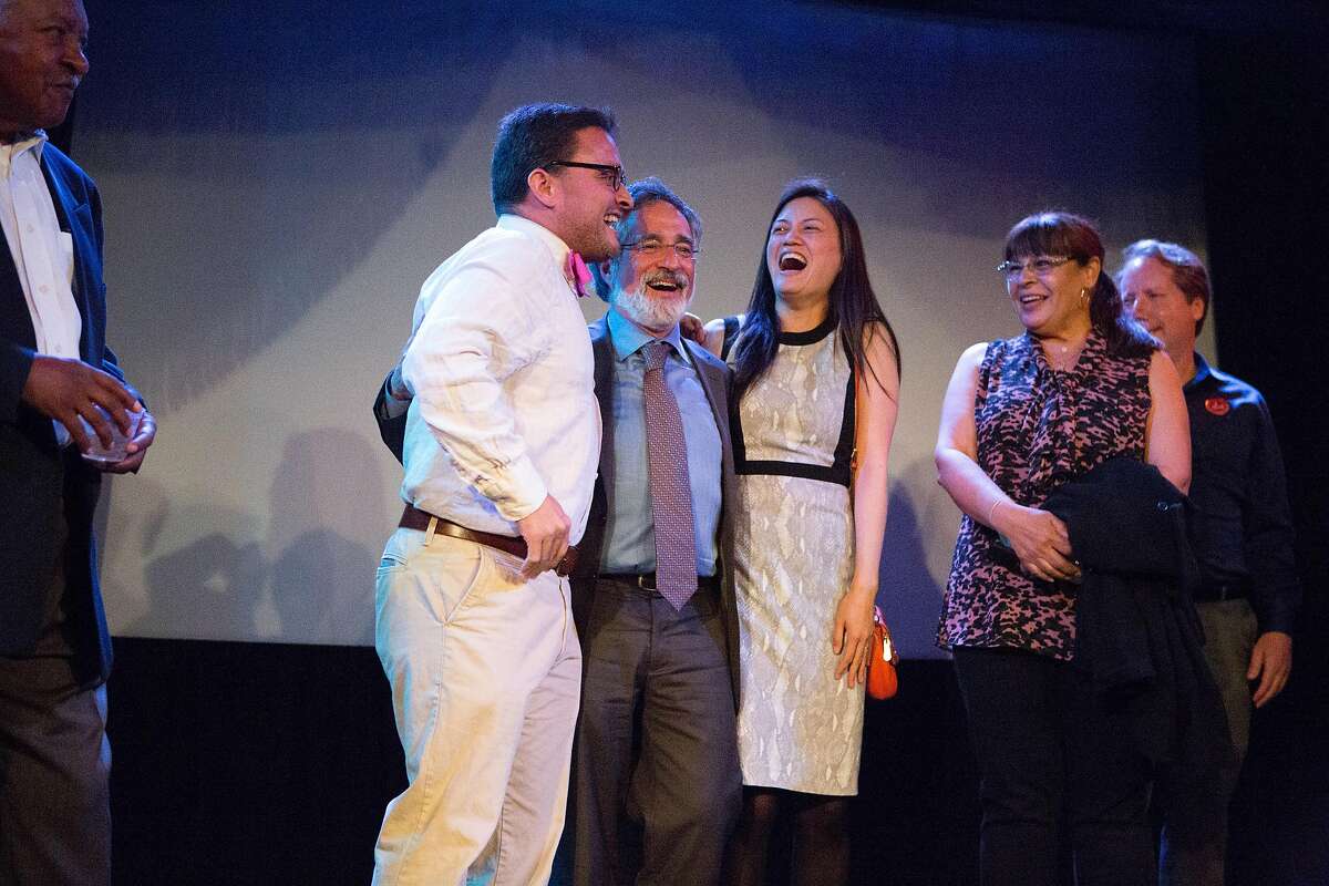 David Campos, Aaron Peskin, and Cindy Wu cheer on the local elected officials he's affiliated with at the Jane Kim election night party at Oasis in San Francisco, Calif. on Tuesday, June 7, 2016.