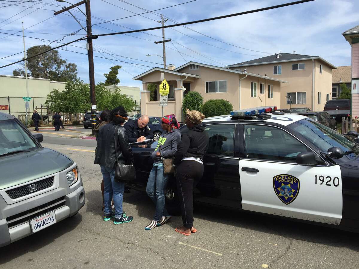 Police speak to a woman who said her 14-year-old daughter escaped a kidnapping attempt Wednesday morning in the 1000 block of 65th Street in North Oakland.