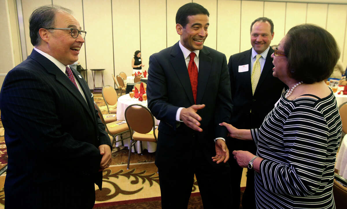 Bexar County District Attorney Nicholas "Nico" LaHood (center) speaks Wednesday June 8, 2016 with Hope Andrade (right) and San Antonio Hispanic Chamber of Commerce President and CEO Ramiro A. Cavazos (left) before LaHood presented his inaugural State of the District Attorney address at the Embassy Suites Riverwalk Hotel. LaHood gave an insider's perspective of the challenges and issues he and his staff have faced on a day-to-day basis.