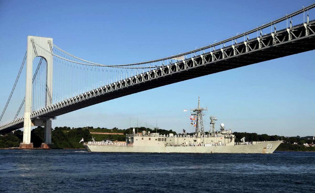 FILE- In this July 19, 2009 file photo, the Australian naval frigate HMAS Sydney passes under the Verrazano-Narrows Bridge as it enters New York Harbor. For over 50 years, the Metropolitan Transportation Authority has spelled the name of the bridge with a single z, but the Italian Italian explorer Giovanni da Verrazzano, whom the bridge is named after, spelled his name with two z's. (AP Photo/Craig Ruttle, File) ORG XMIT: NYR102