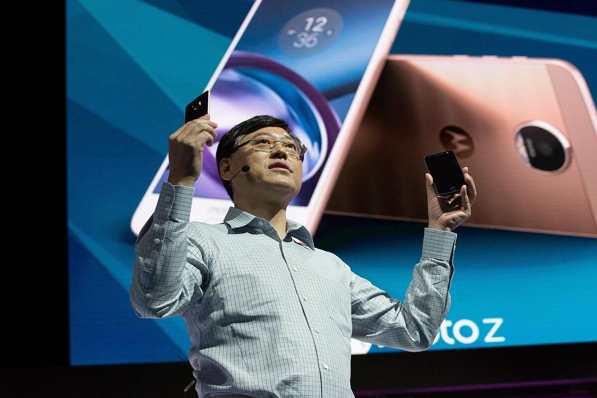 Lenovo CEO Yang Yuanqing unveils Lenovo's Moto Z smartphone at the Lenovo Tech World conference in San Francisco, Calif. on June 9, 2016.