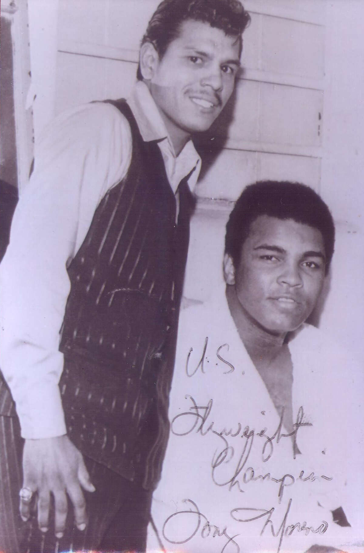 Tony Moreno is pictured with Muhammed Ali during a 1972 appearance in San Antonio.