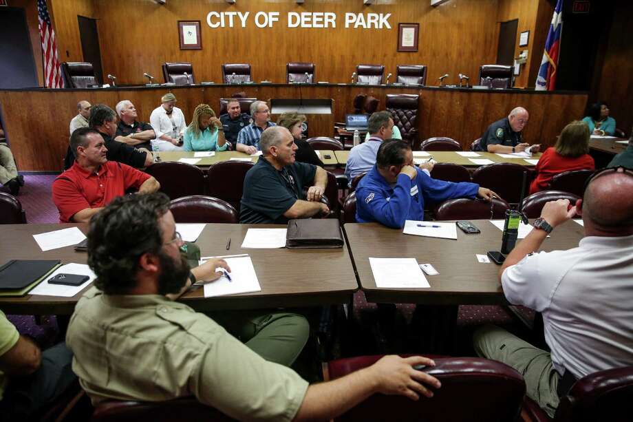 Members of the Deer Park Local Emergency Planning Committee listen to a presentation about hurricane threats by Dan Reilly from the National Weather Service at their monthly meeting at Deer Park City Hall Tuesday, May 24, 2016. Attendees include representitives from chemical plants in the area, city personnel and first responders. Photo: Michael Ciaglo, Houston Chronicle / © 2016  Houston Chronicle