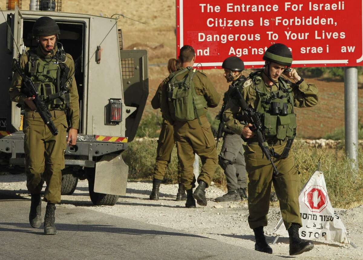 Israeli soldiers on Thursday searched ﻿the Palestinian village of Yatta﻿ for clues leading to Wednesday night's deadly shooting in Tel Aviv. The attackers are believed to be from the village. ﻿