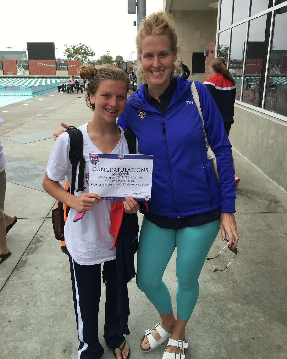 Greenwich resident Kaila Carroll, left, with Olympic gold medalist Betsey Armstrong after she earned a spot on the USA Water Polo Women’s 14-under National Team.