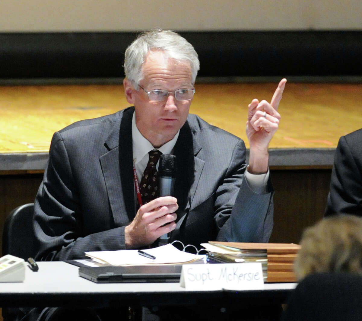 Peter Sherr, left, a school board member, has criticized Superintendent of Schools William McKersie, right.