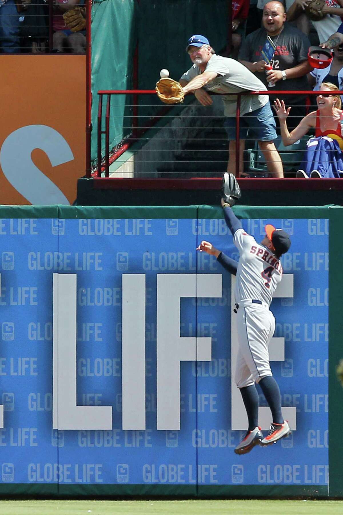 If you read the signs, the Astros' hopes of a Thursday win were on life support even before the Rangers' Rougned Odor homers in the eighth inning just beyond the reach of Astros right fielder George Springer.