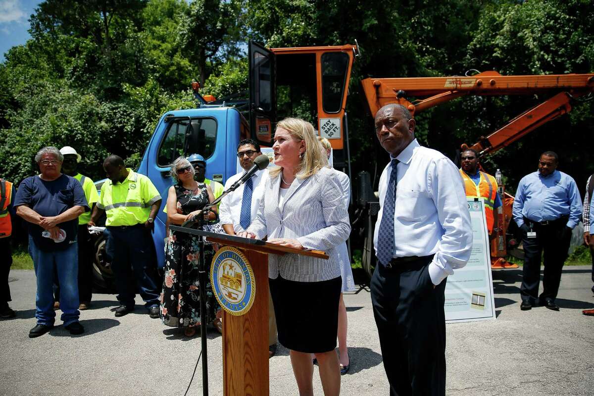 Texas senator Sylvia Garcia stands next to mayor Sylvester Turner at a press conference to urge the governor to declare a disaster in order to help the city remove breeding grounds for mosquitos that could carry the zika virus Thursday, June 9, 2016 in Houston.