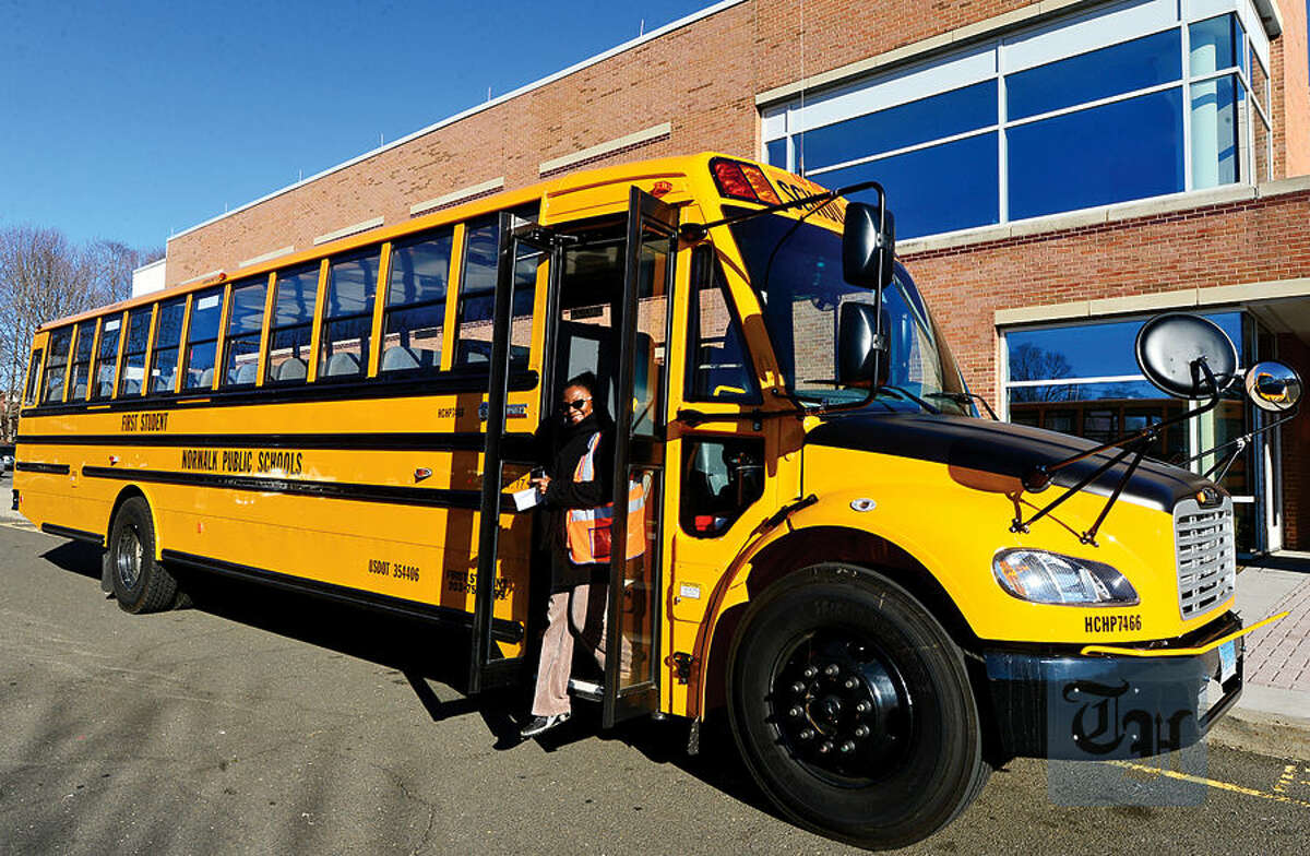 Hour photo / Erik Trautmann First Student Safety Manager Benita Hargett exits one of the new Thomas Built SAF-T-LINER® C2 school buses that go into service this week.
