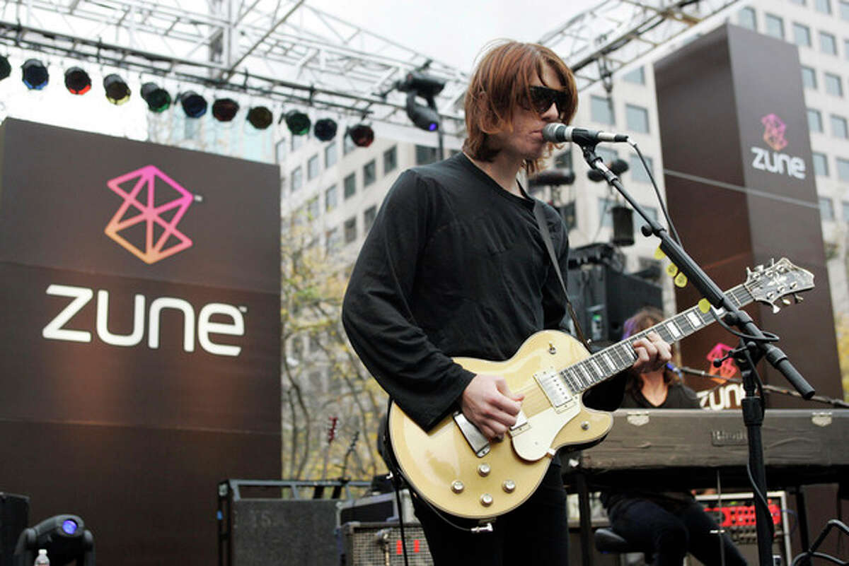 FILE - In this Nov. 13, 2006 file photo, Benjamin Curtis with the band Secret Machines performs at a launch party for Microsoft's new music player Zune at Westlake Park in downtown Seattle. Curtis, guitarist and co-founder of the popular indie-rock band School of Seven Bells, has died on Dec. 29, 2013, of cancer. He was 35. (AP Photo/John Froschauer, File)