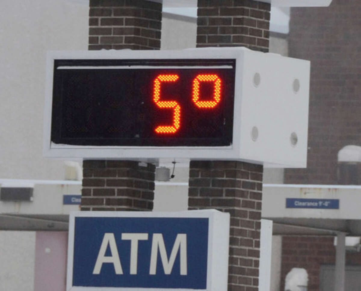 A bank thermometer reads in the single digits on Friday, Jan. 3, 2014, in Hazleton, Pa. Northern and eastern Pennsylvania saw 6 to 8 inches of snow, while southern and western Pennsylvania saw 2 to 5 inches, the National Weather Service said. (AP Photo/Hazleton Standard-Speaker, Eric Conover)