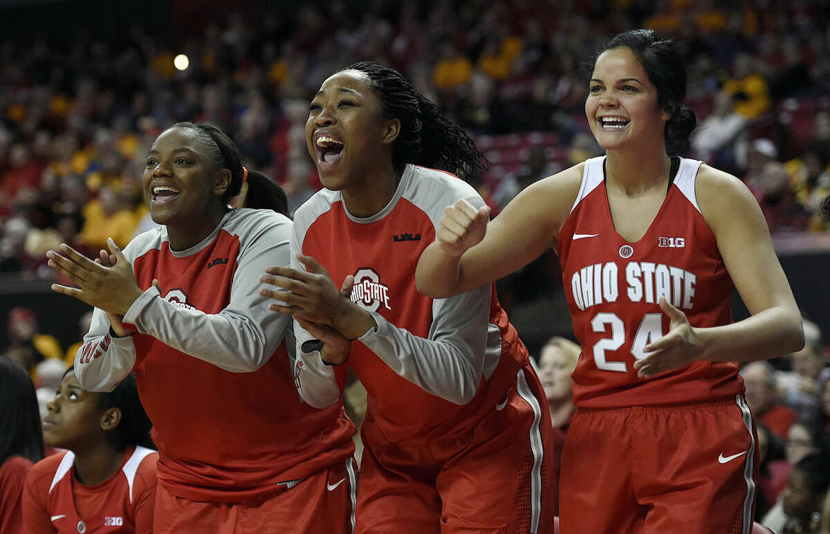 The Ohio State bench including Makayla Waterman, right, cheer their team against Maryland in the first half of an NCAA college basketball game, Saturday, Jan. 2, 2016, in College Park, Md. Ohio State won 80-71. (AP Photo/Gail Burton)