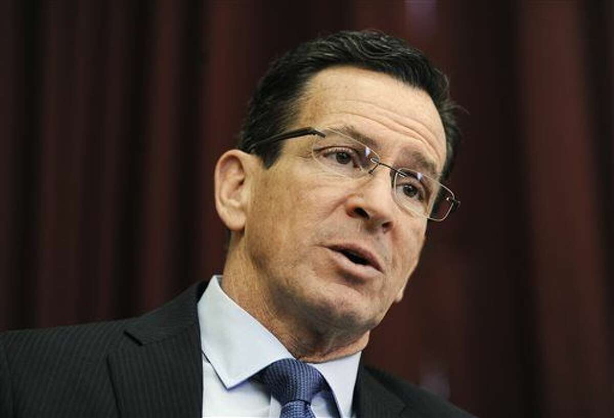 Connecticut Gov. Dannel P. Malloy is interviewed by The Associated Press in his office at the State Capital before he is sworn in for his second term, Wednesday, Jan. 7, 2015, in Hartford.