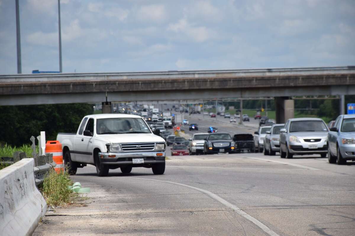 Police cause West Side traffic jam by closing highway to take scene