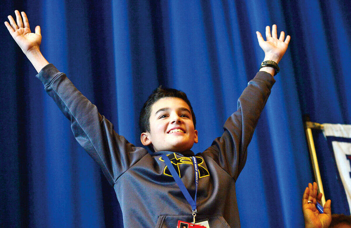 Hour photo / Erik Trautmann Nathan Hale Middle School 8th grader, Tyler Pereira, wins the schoolwide Geography Bee Thursday.
