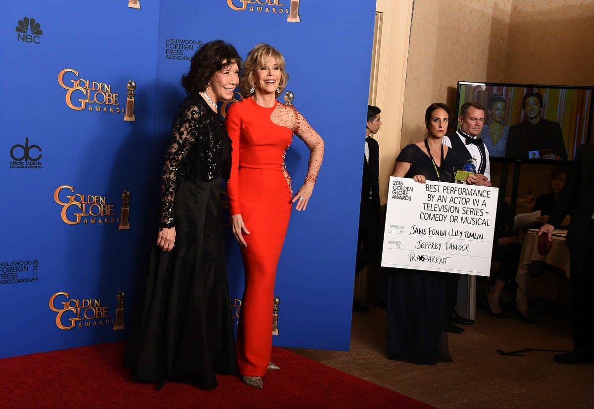 Lily Tomlin, left and Jane Fonda pose in the press room at the 72nd annual Golden Globe Awards at the Beverly Hilton Hotel on Sunday, Jan. 11, 2015, in Beverly Hills, Calif. (Photo by Jordan Strauss/Invision/AP)